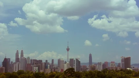 Time lapse of moving clouds over downtown Kuala Lumpur, Malaysia Stock Footage 87637022
