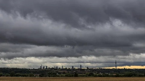 Time Lapse - Moving clouds over a field in autumn Video stock 95708922