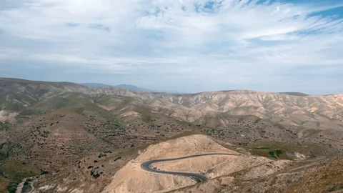 Time lapse - Moving clouds over the The Judaean Desert in Israel. Video stock 106752550