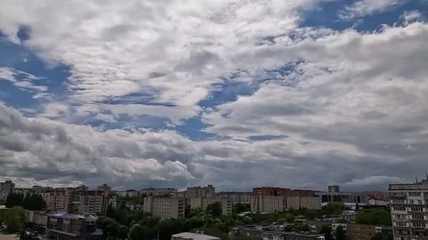 Time-lapse of moving clouds over a residential district in Stavropol Stock Footage 337302204