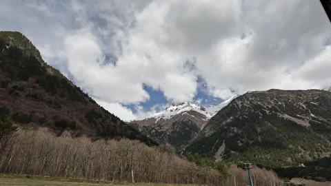 Time-lapse of moving clouds over mountain peaks in North Ossetia Stock Footage 337302205
