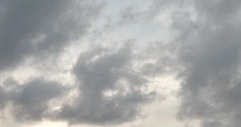 Time lapse of moving clouds on a rainy day 스톡 동영상 141936573