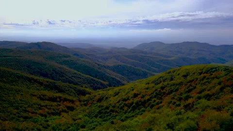 Time-lapse of the moving clouds in the sky over the Csovanyos -Borzsony National Stock Footage 141875452