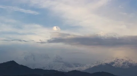 Time lapse of moving clouds at sunset.  Himalayas in the clouds. View from Pokha Video stock 57678178