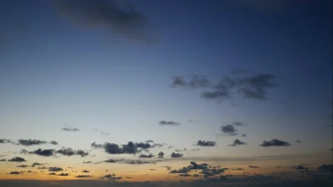 Time lapse moving cloudy golden blue twilight evening sky background after su Stock Footage 130484799