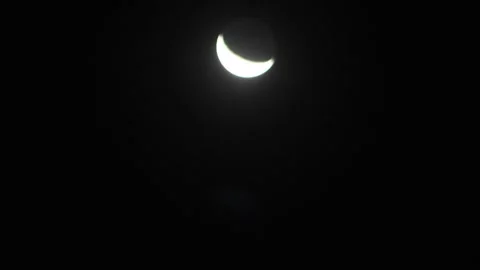 Time-Lapse Of The Moving Crescent Moon Displays A Beautiful Optical Flare 스톡 동영상 243956066