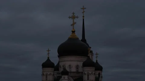 Time lapse of moving dark clouds behind one dome with crosse of Orthodox Church Stock Footage 201421245