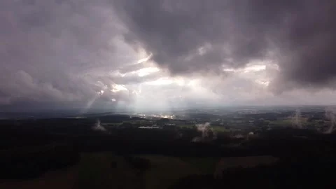Time lapse of moving down as the sun spreads rays through the clouds . Stock-Footage 142575526