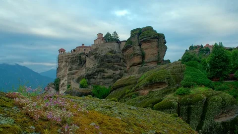 Time lapse of moving morning clouds above the monastery in Meteora, Greece Stock Footage 77938164