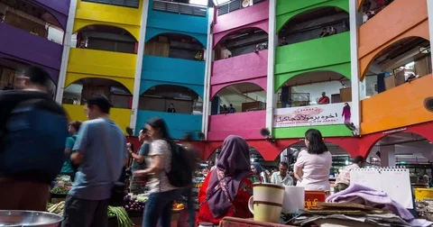 Time lapse of moving people in Pasar Besar Siti Khadijah in Kelantan, Malaysia Stock Footage 77675907
