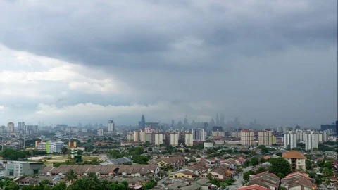 Time lapse of moving rainy clouds in Kuala Lumpur, Malaysia Stock Footage 79822441