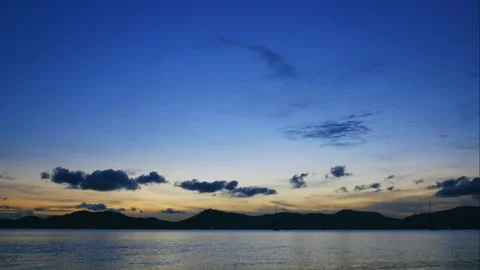 Time lapse moving sea wave water , yacht sailboat mooring in sea, moving clou Stock Footage 130890703