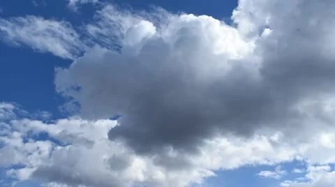 Time Lapse Of Moving  White Clouds in Blue Sky Stock Footage 48767944
