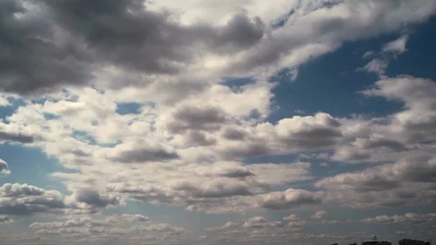Time lapse of moving white fluffy clouds and blue sky Stock Footage 89401823