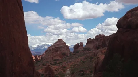 Time lapse MS red rock formations, sky, white cloud shadows moving Stock Footage 41750745