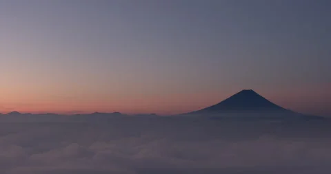 Time-Lapse Mt. Fuji floating in the sea of clouds at dawn. Stock Footage 161256077