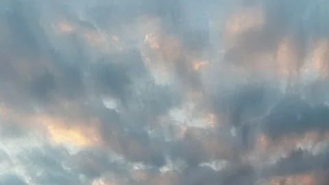 Time lapse of multi-colored clouds moving in the sky during sunset Vídeos de archivo 229100811