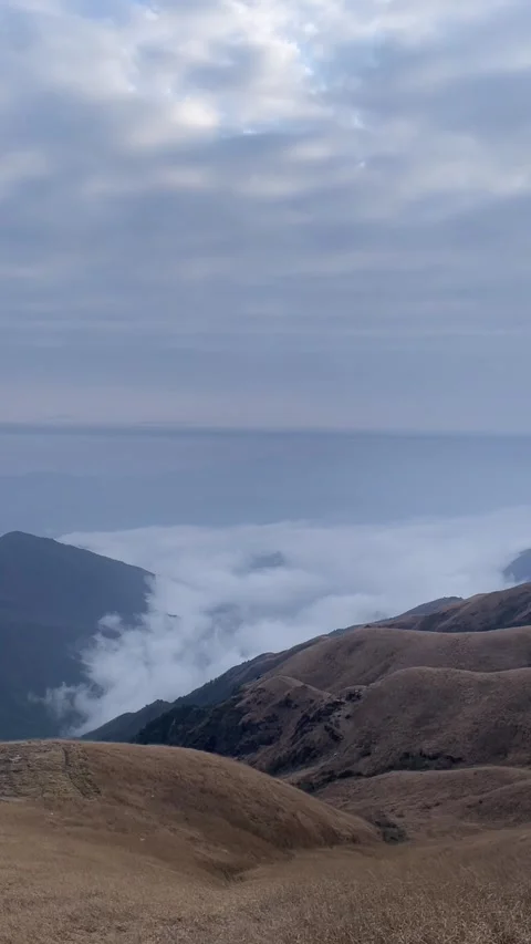 Time-lapse of Multi-Layered Clouds Moving in Opposite Directions Stock Footage 328896100