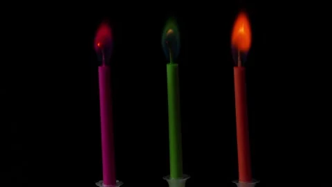 Time lapse of multicoloured small birthday candles burning on black background Stock Footage 139126743