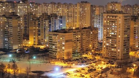 Time lapse of multistorey buildings with changing window lighting at night Stock Footage 102584098