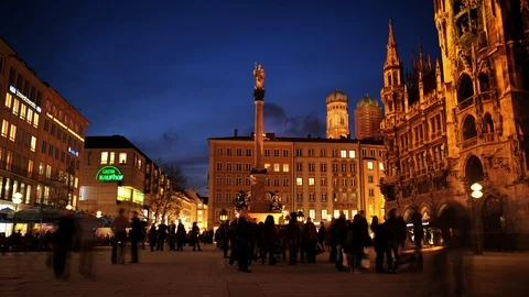 Time Lapse of Munich Crowd of People Walking on Famous Marienplatz Dusk to Night Video stock 104964034