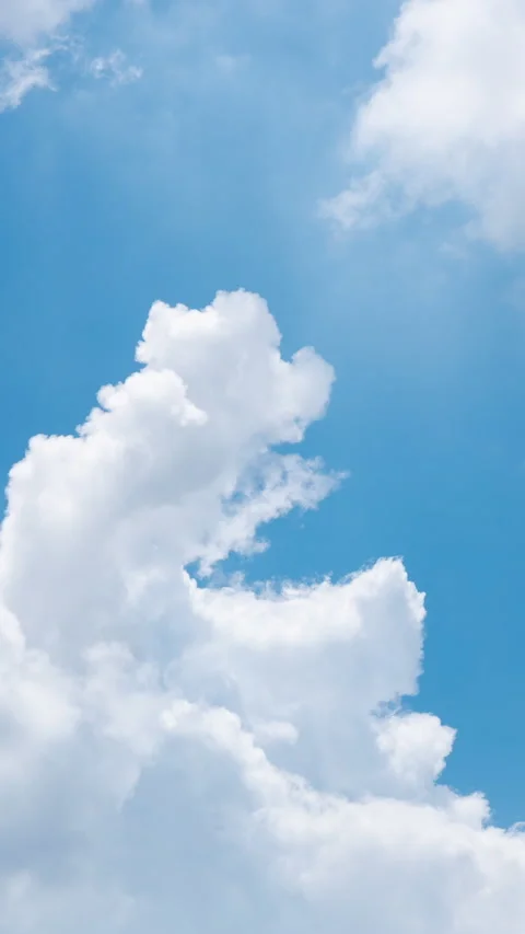 Time lapse of nature clouds moving over blue sky in raining season Stock Footage 231315073