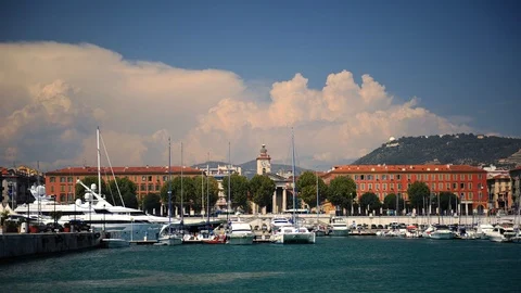 Time Lapse of Nice City Skyline Car Traffic and Yacht Docked in Cote D'azur Port Video stock 98936877