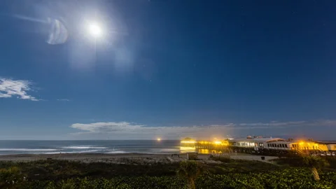 Time Lapse - Night cloudscape of Coco Beach Pier, Florida Video stock 243542907