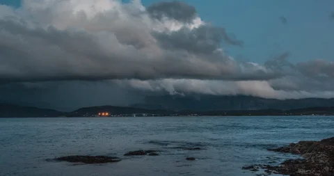 Time lapse at night. Great moving clouds-cloudscape. The Bay in Norway, Bodo Stock Footage 130087294