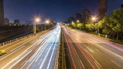 Time lapse night motion light trails on a busy freeway Stock Footage 74421858