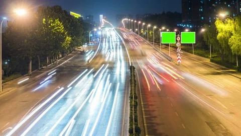 Time lapse night motion light trails on a busy freeway Видео 74422103