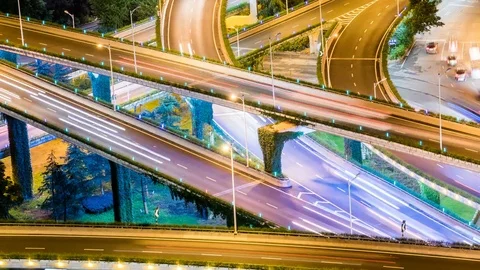 Time lapse night motion light trails on a busy freeway Stock Footage 77917280