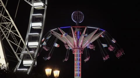 Time Lapse Night Ride Theme Park, Paris - 60fps Stock Footage 53948433