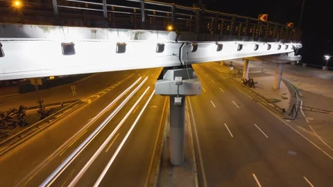 Time-Lapse of a Night Road in Continuous Motion Stock Footage 244782161