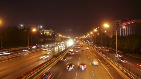Time lapse of night scene of streams of traffic in Beijing. Stock Footage 46775908