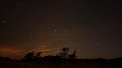 Time-lapse of the night sky with dunes in foreground Stock Footage 55262149