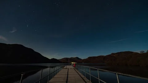 A time-lapse off the night sky over Aira Force Steamer Jetty on a Moonlit nig Stock Footage 326655267