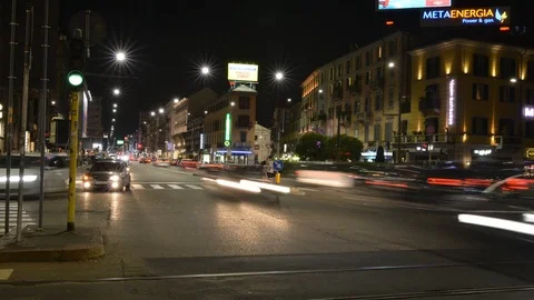 Time lapse of night traffic at Corso Buenos in Milan's Porta Venezia district Stock Footage 90176141