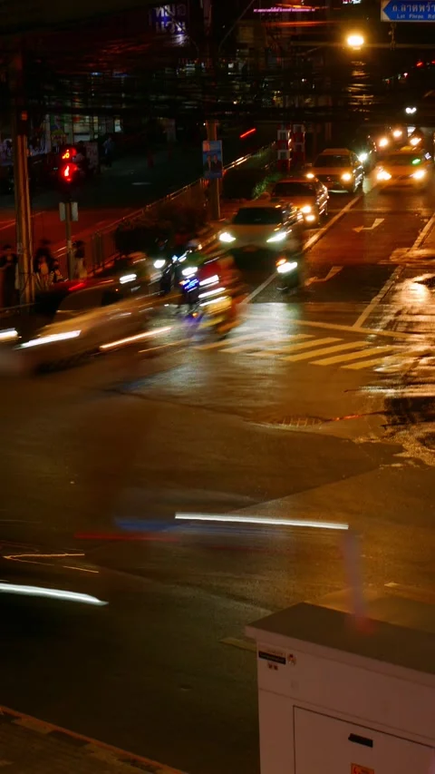 Time Lapse Night Traffic Light Trails at Busy Bangkok Intersection Stock Footage 340943327