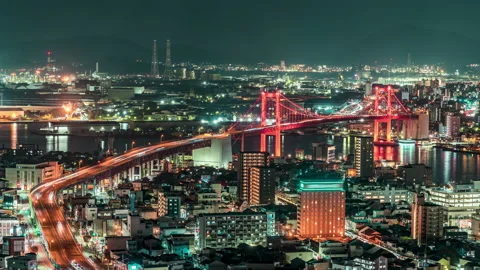 Time lapse night view cityscape Wakato bridge at Kitakyushu Fukuoka 스톡 동영상 228340094