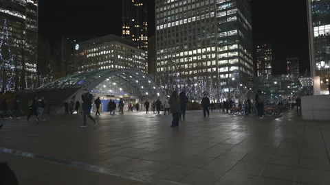 Time lapse. A night view of a crowded square in a financial district. Stock Footage 167340067