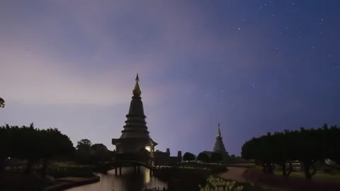 Time lapse night view of moving stars at Phra Mahathat on Doi Inthanon Stock Footage 234129976