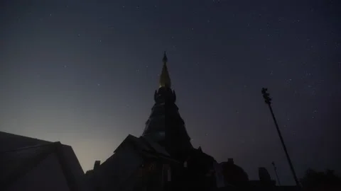 Time lapse night view of moving stars at Phra Mahathat on Doi Inthanon Stock Footage 234129982