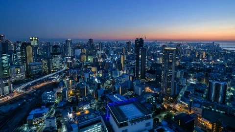 Time-lapse night view of Osaka skyline from Umeda Sky building observatory Video stock 127613751