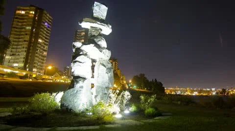 Time Lapse night view of Vancouver's English Bay Stone Inukshuk Stock Footage 12523283