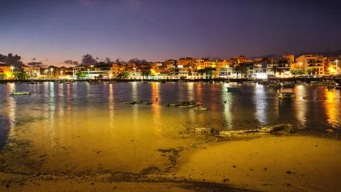 A time lapse of a nightfall on the bay in a small tourist town Stock Footage 277307485