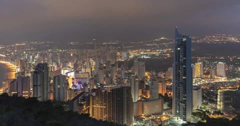 Time lapse of nightfall over the skyscrapers in the city of Benidorm, Spain Stock Footage 170835388