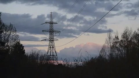 Time lapse of nightfall with transmission tower Stock Footage 74869086