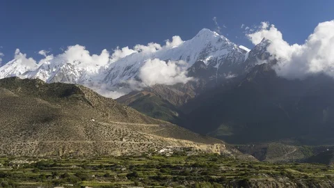 Time lapse of Nilgiri mountain peak view from Jomsom village Stock Footage 128165908