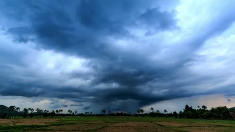 Time-Lapse of Nimbus Clouds and Rain Over Field Video stock 302856763